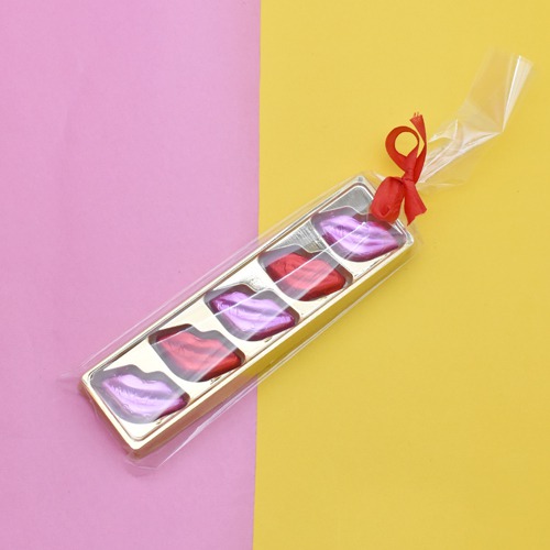 Five Lips Shaped Chocolate Decorated with Colourful paper in a Lip Shape packed