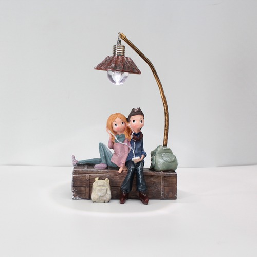 Cute Romantic Valentine Love Couple Sitting On Sofa Statue Showpiece