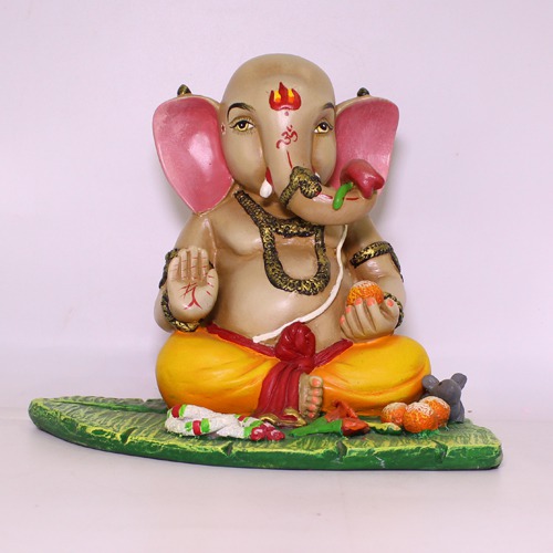 Taklu  Lord Ganesha Sitting on banana Leaf Showpiece For Home Decor