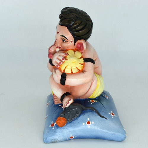 Bal Ganesha Sitting On Pillow With Modak Idol For Home Decor