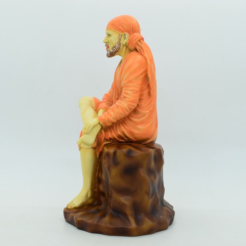 Sai Baba Murti | Lord Sai Baba Idol Sitting On Stone Antique showpiece, Made of Fiber for car dasboard