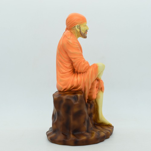 Sai Baba Murti | Lord Sai Baba Idol Sitting On Stone Antique showpiece, Made of Fiber for car dasboard