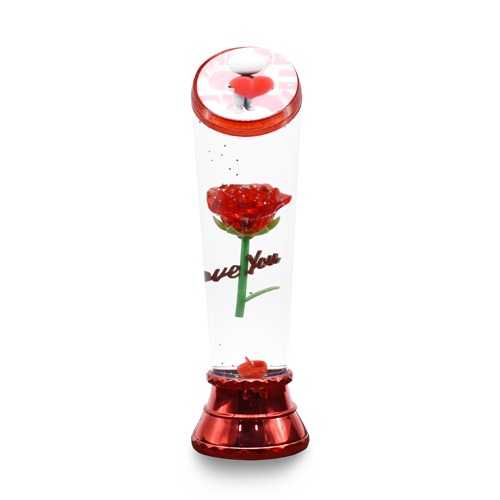 Beauty and the beast eternal rose flower floating in a snow glass bottle with multicolored LED lighting for this Valentines Day