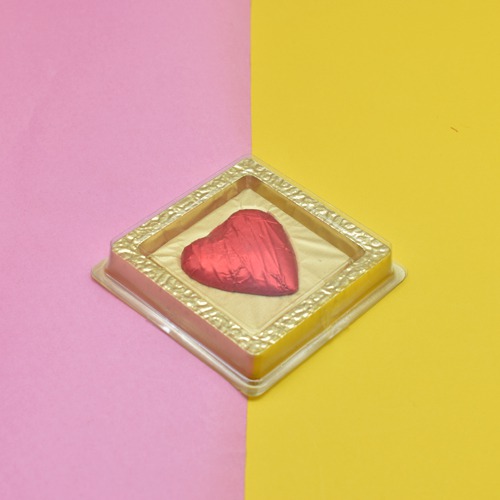 Heart Shape Chocolate Wrapped In Red  Foil Paper