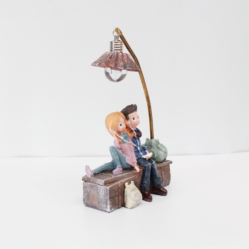Cute Romantic Valentine Love Couple Sitting On Sofa Statue Showpiece