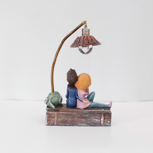 Cute Romantic Valentine Love Couple Sitting On Sofa Statue Showpiece