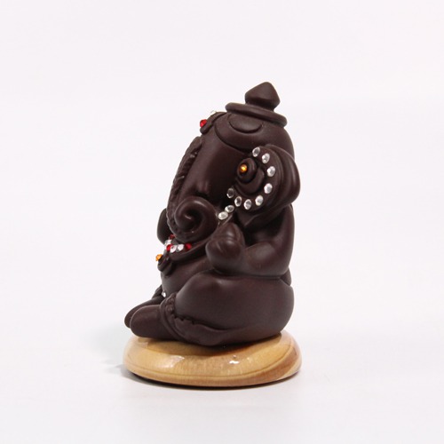 Small Brown Decorative Sitting Ganesha Idol For Car Dashboard