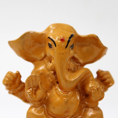 Yellow Lord Ganesh Sitting on the Hand Statue For Home & Office Decor