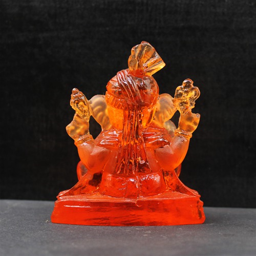 Orange Polyresin Maharaj Ganesh Idol For Card Dashboard