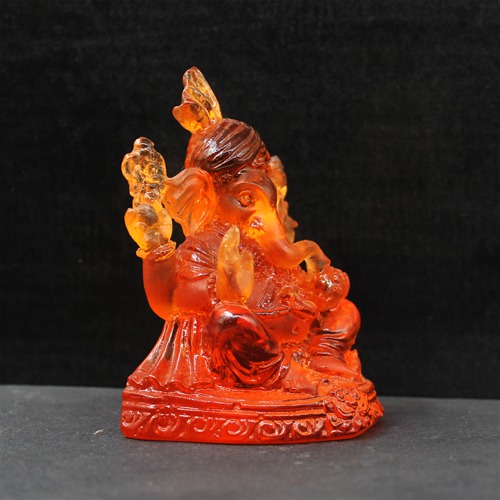 Orange Polyresin Maharaj Ganesh Idol For Card Dashboard