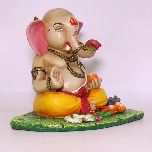 Taklu  Lord Ganesha Sitting on banana Leaf Showpiece For Home Decor