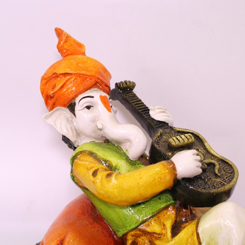 Modern Sitting  Lord Ganesha Playing Guitar Showpiece For Home Decor