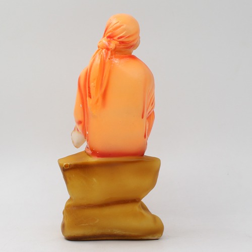 Sai Baba Sitting On Stone Statue Fiber Statue, Orange Sai baba, Medium Size 6 Inch