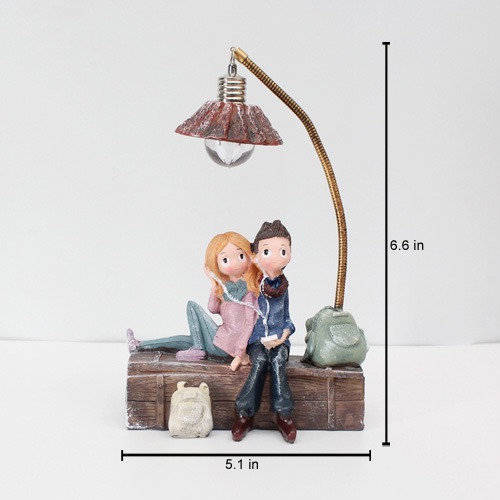 Cute Romantic Valentine Love Couple Sitting On Sofa Statue Showpiece